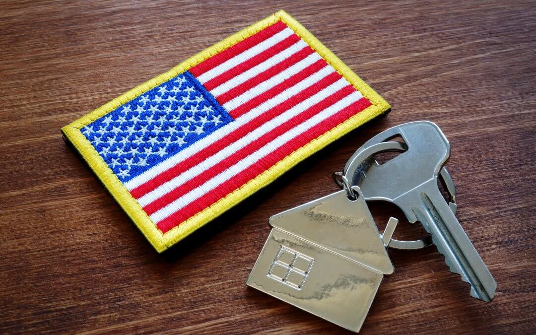 american flag and house key