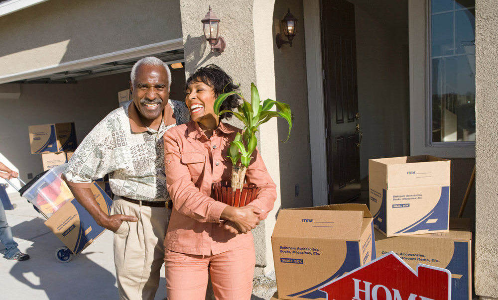 middle aged couple moving